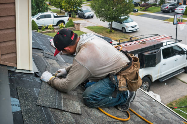 Professional Roofing technician working in Crowheart, WY